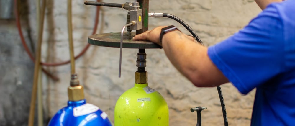 Weber & Troseth technician performing high pressure hydrostatic testing